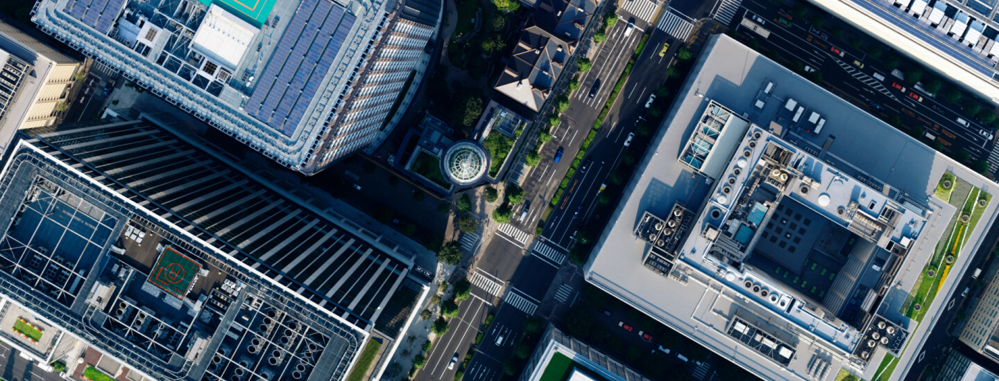 Top down view of the and area of london with the gherkin at the centre